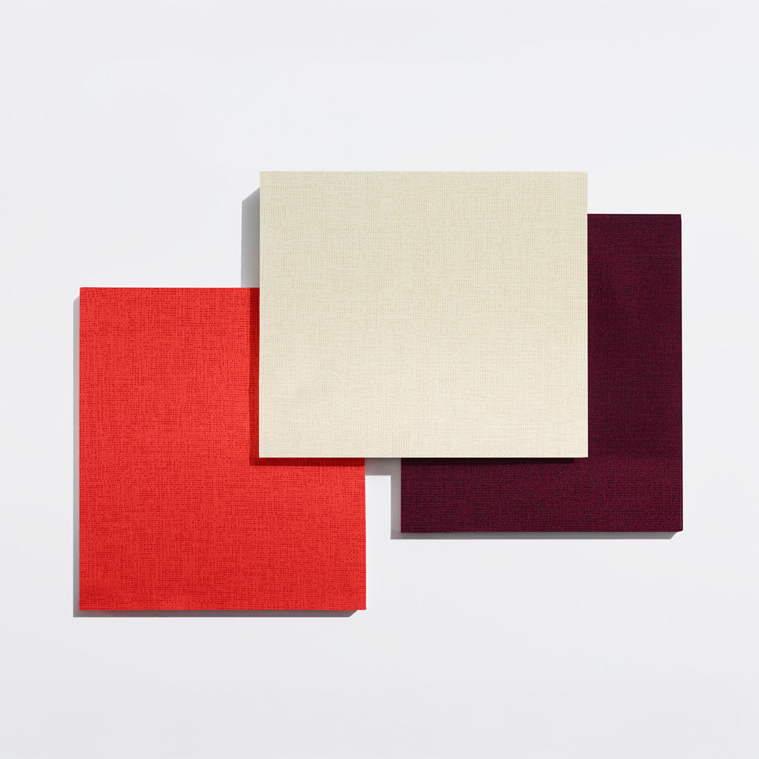 Acoustic absorbers concealed behind Duvaltex fabric in a refined interior